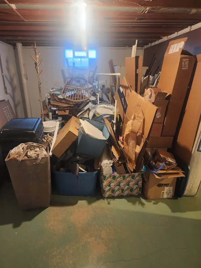 Roll-off dumpster container at job site for 4 Yard Dumpster Rental in Palm Valley